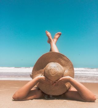 Person Laying On Sand